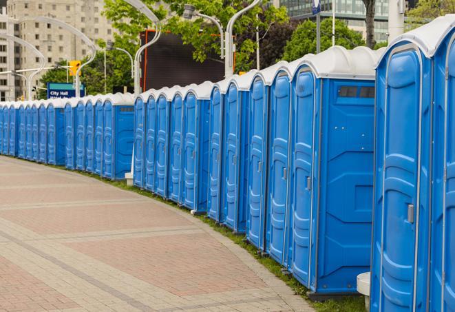 a row of portable restrooms at a fairground, offering visitors a clean and hassle-free experience in weston